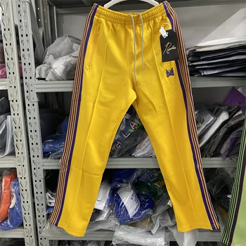 Спортивные штаны с желтыми иглами, мужские и женские гладкие спортивные брюки с логотипом бабочки, трикотажные брюки в фиолетовую полоску.